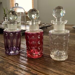 Set of three glass apothecary jars